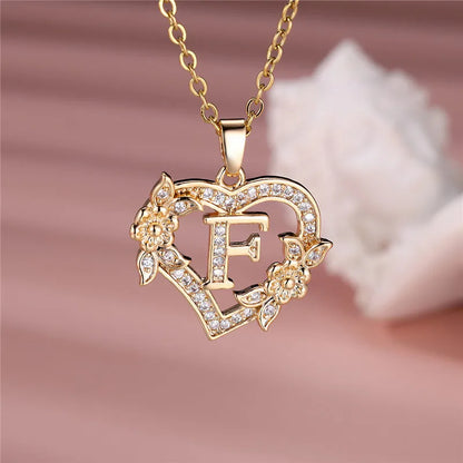 💛 GlowLuxe HeartBloom Initial Necklace – Custom Letter Gold Heart Pendant with Floral Design