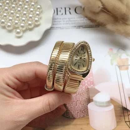 ⌚ GlowTime Serpentina – Gold Serpentine Quartz Bracelet Watch