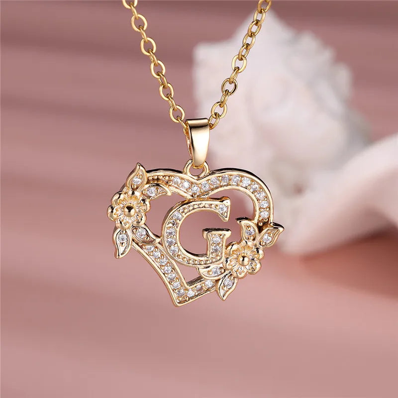 💛 GlowLuxe HeartBloom Initial Necklace – Custom Letter Gold Heart Pendant with Floral Design