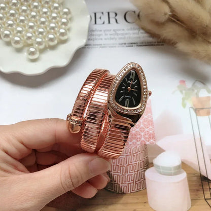 ⌚ GlowTime Serpentina – Gold Serpentine Quartz Bracelet Watch