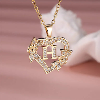 💛 GlowLuxe HeartBloom Initial Necklace – Custom Letter Gold Heart Pendant with Floral Design