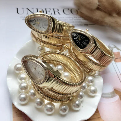 ⌚ GlowTime Serpentina – Gold Serpentine Quartz Bracelet Watch