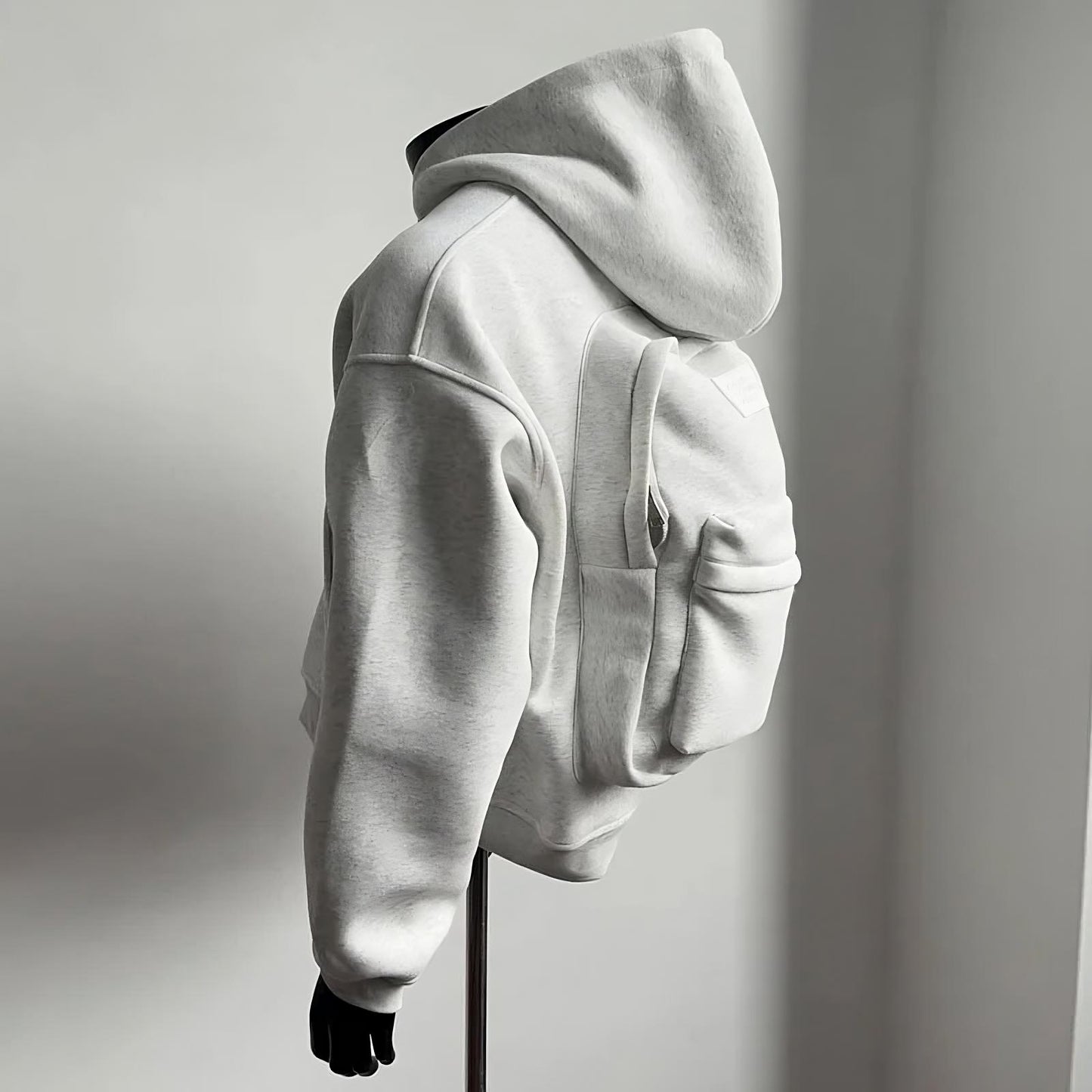 🎒 GlowPack – Hoodie with Built-in Backpack