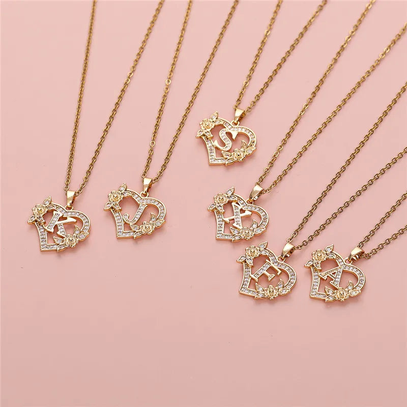 💛 GlowLuxe HeartBloom Initial Necklace – Custom Letter Gold Heart Pendant with Floral Design