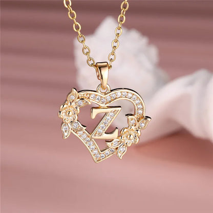 💛 GlowLuxe HeartBloom Initial Necklace – Custom Letter Gold Heart Pendant with Floral Design