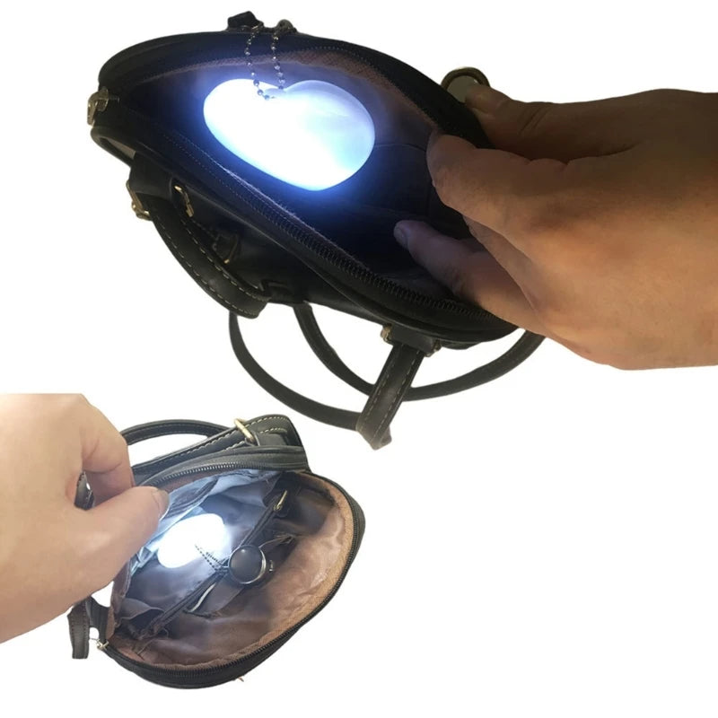 💖 GlowLite HeartBeam – Motion-Activated LED Purse Light