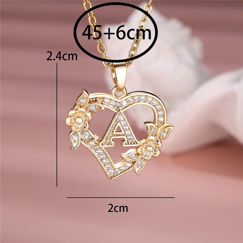 💛 GlowLuxe HeartBloom Initial Necklace – Custom Letter Gold Heart Pendant with Floral Design