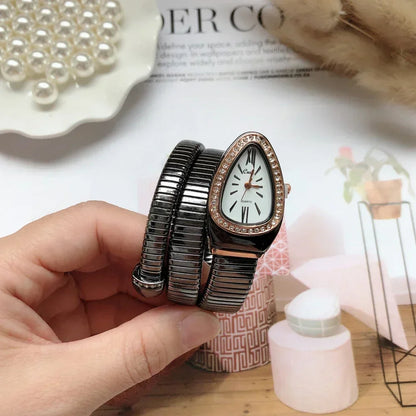 ⌚ GlowTime Serpentina – Gold Serpentine Quartz Bracelet Watch