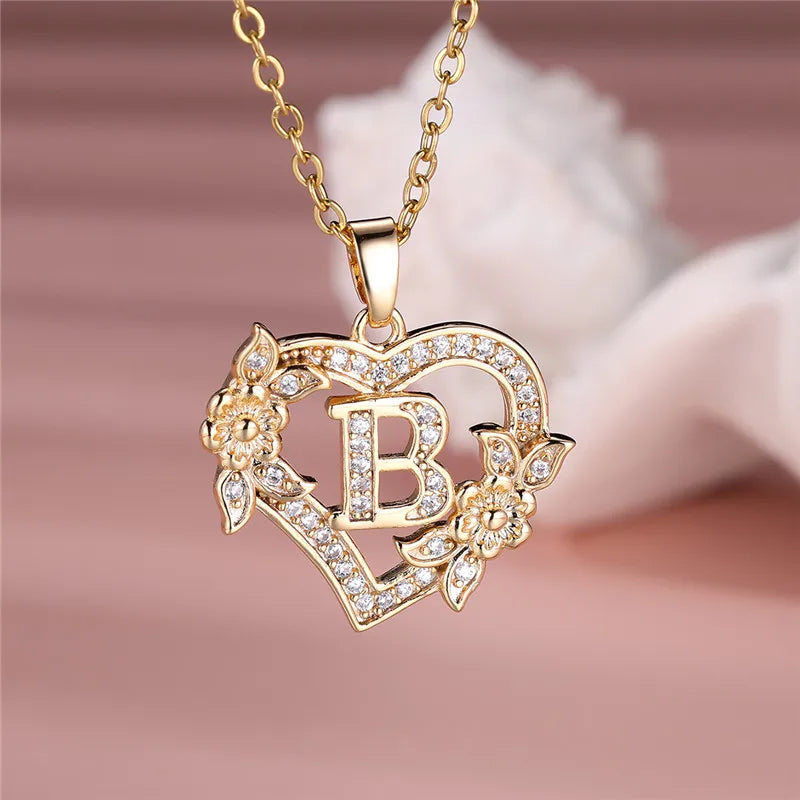 💛 GlowLuxe HeartBloom Initial Necklace – Custom Letter Gold Heart Pendant with Floral Design