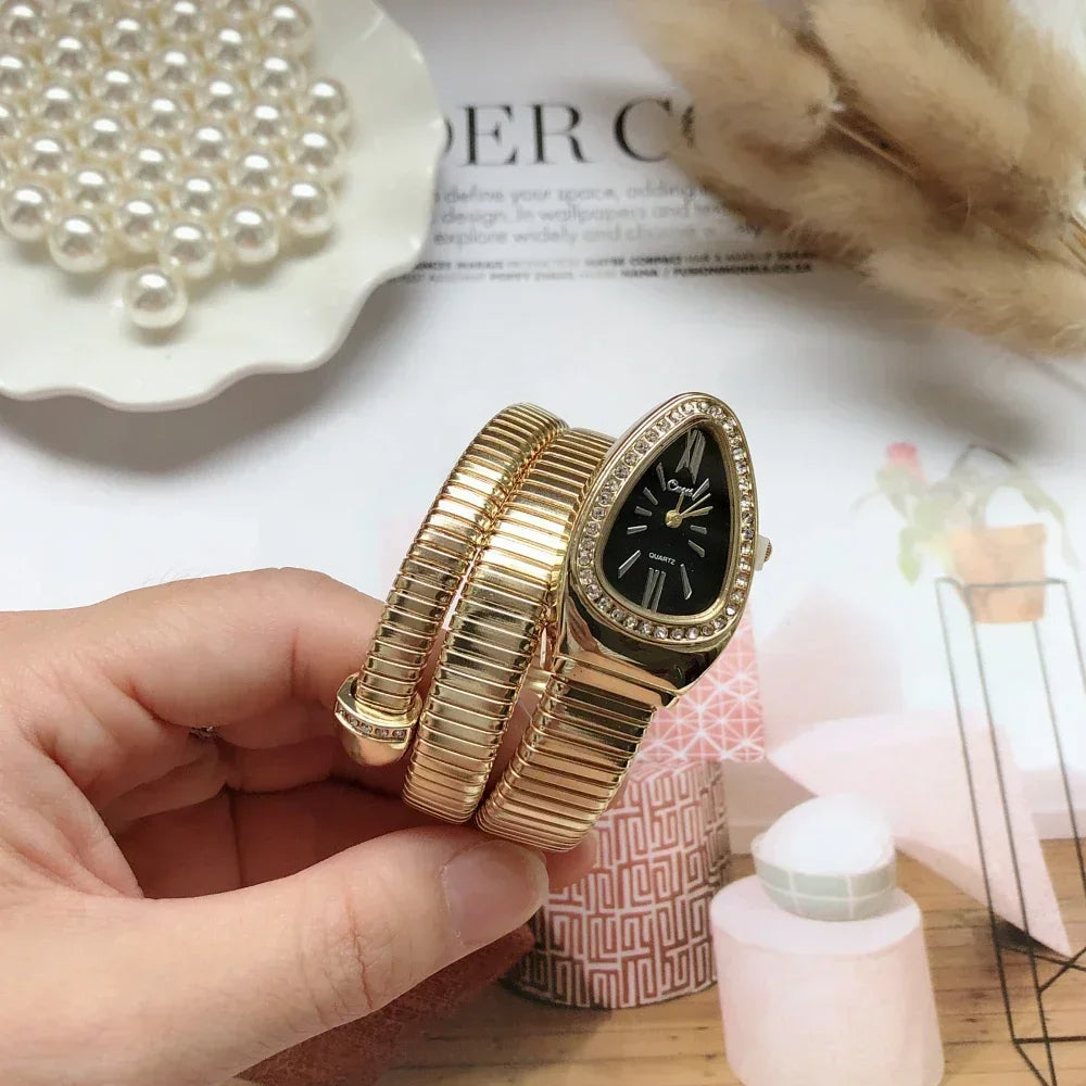 ⌚ GlowTime Serpentina – Gold Serpentine Quartz Bracelet Watch